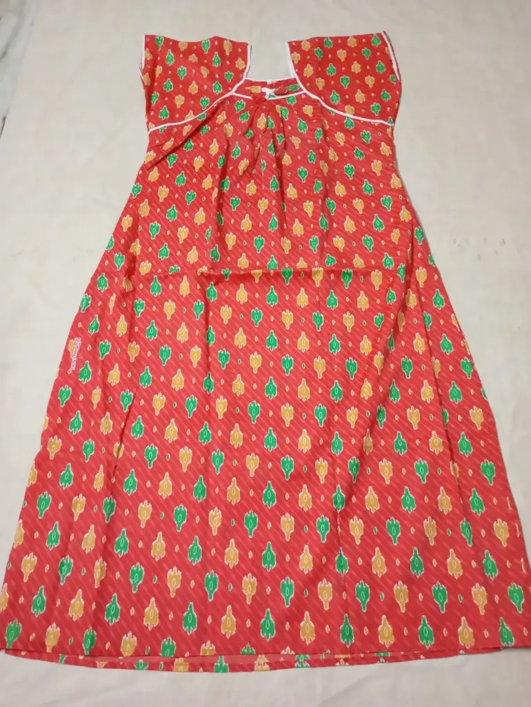 Warm red base with green and yellow floral motifs nighty - free size