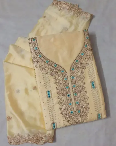 Elegant Yellow Embroidered Jam Cotton Dress Material with Stone Work